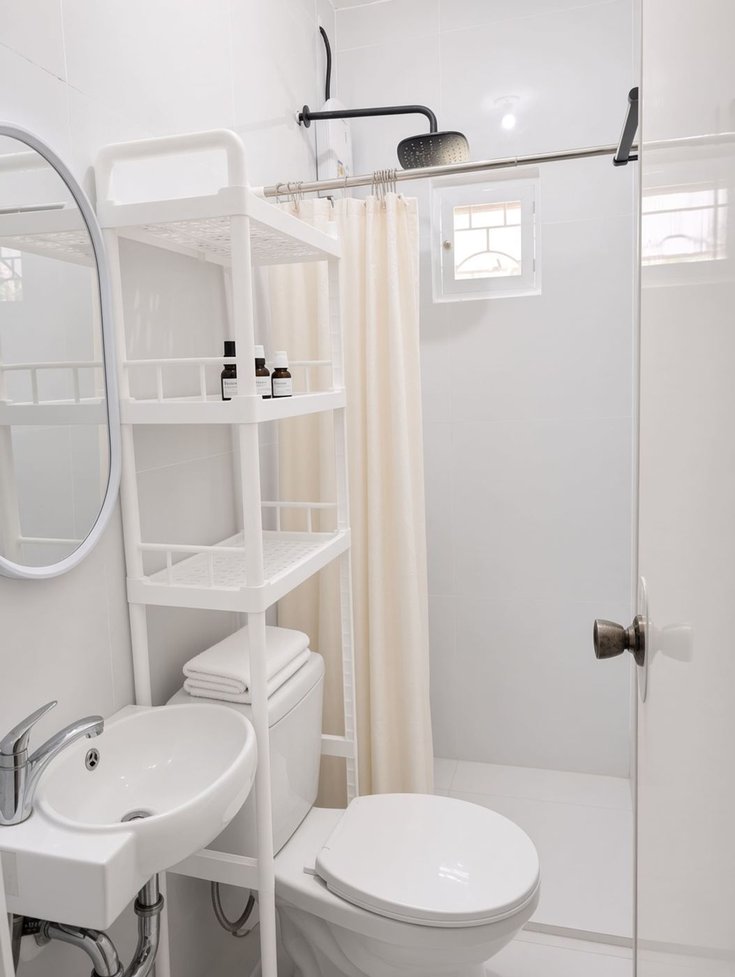 Bathroom with shower, toilet and sink